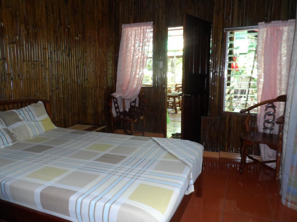 Victoria Guest House And Cottages Puerto Princesa Exterior photo